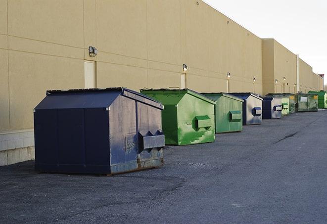 large construction waste containers in a row at a job site in Braintree MA